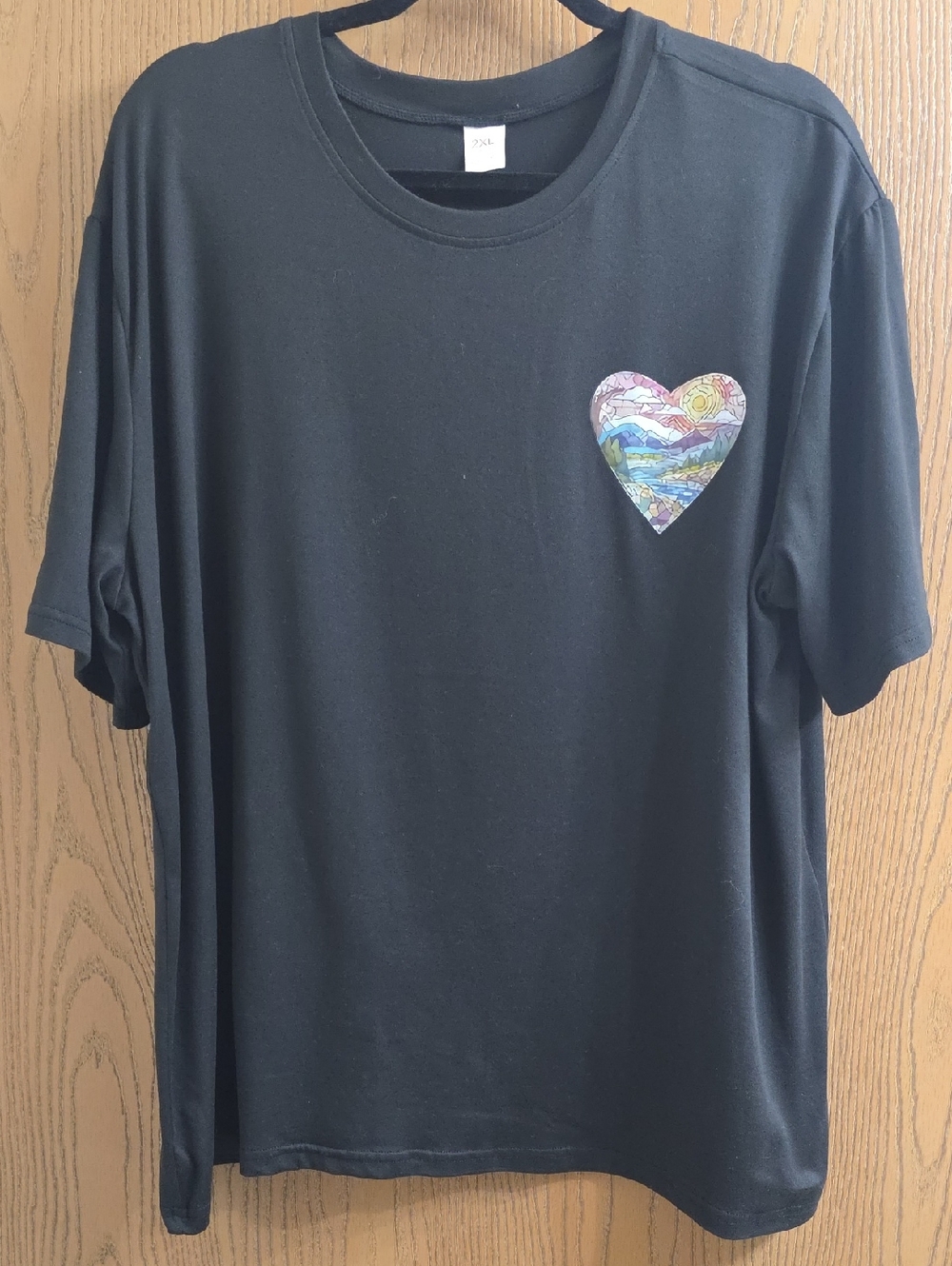 Black Short Sleeve Tee with Multicolor Heart Graphic